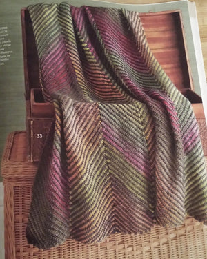 Timeless Noro Knit Blankets: 25 Colorful & Cozy Throws