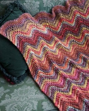 Timeless Noro Knit Blankets: 25 Colorful & Cozy Throws